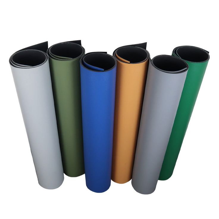 Multi-colour rubber flooring rolls in grey, green, blue, orange, and grey