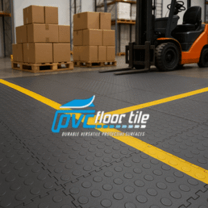 Staging area interlocking tile with yellow lines in warehouse