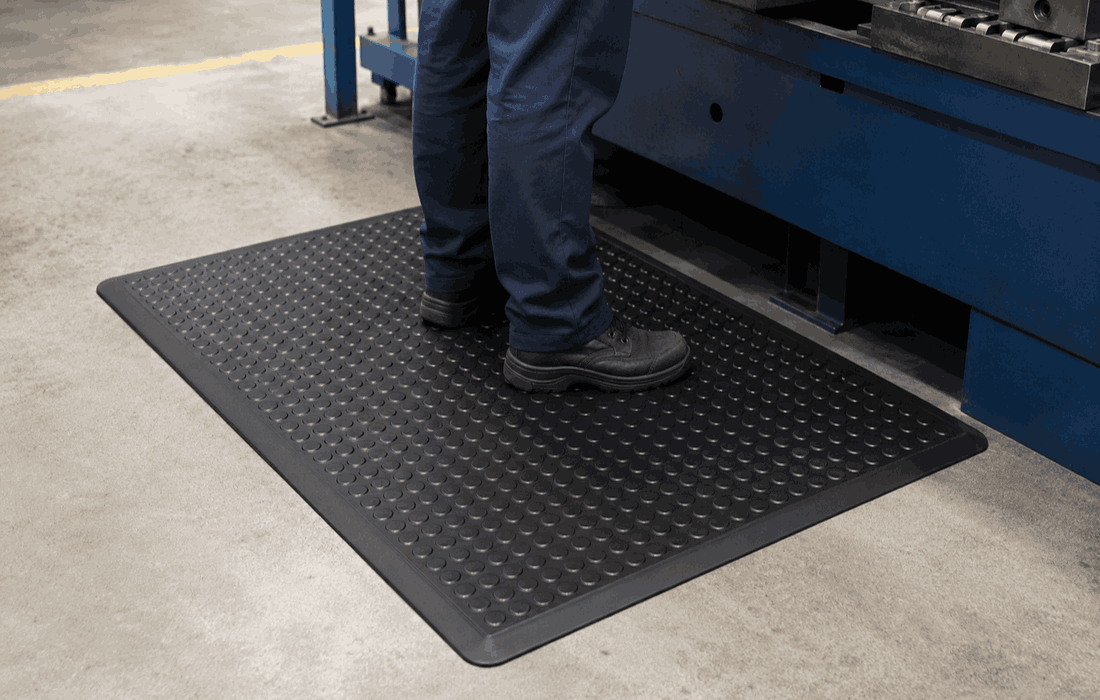 Anti-fatigue rubber mats for standing work areas