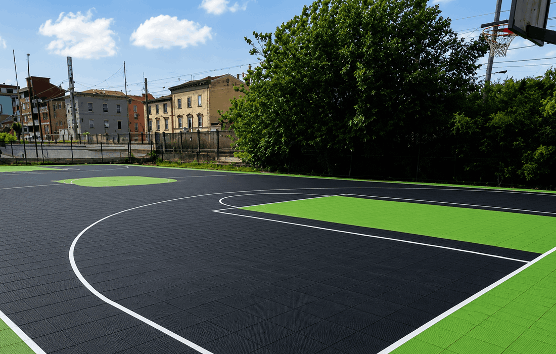 Playground fitted with protective floor tiles