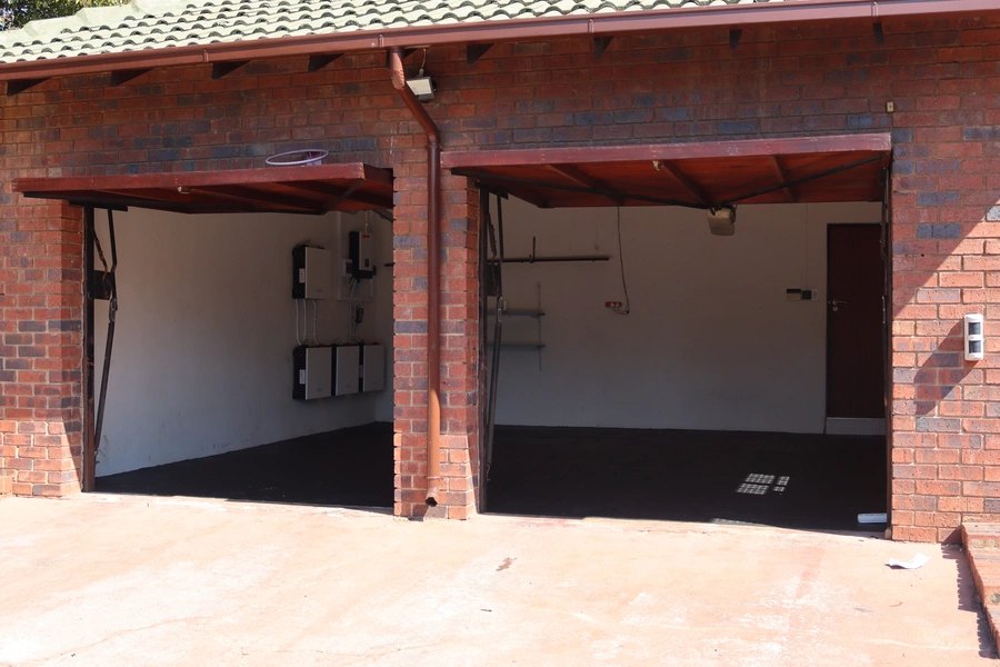 Interlocking rubber tiles installed in Simba's double garage in Brightston