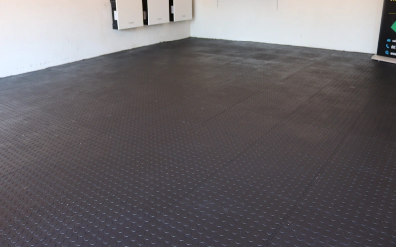 Finished rubber tile flooring in Simba's double garage