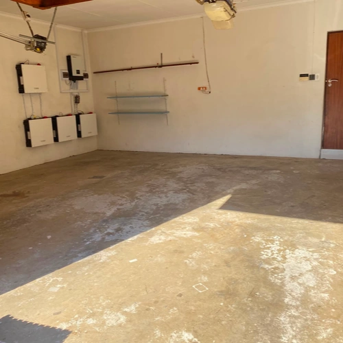 Double garage floor before rubber tile installation
