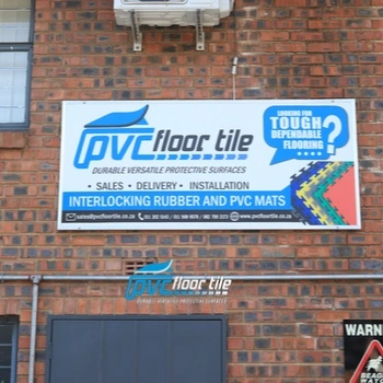 PVC Floor Tile company building with exterior business signage