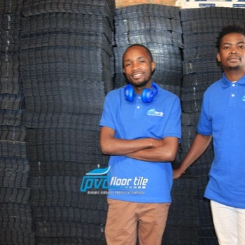 PVC Floor Tile marketing team members at the manufacturing facility