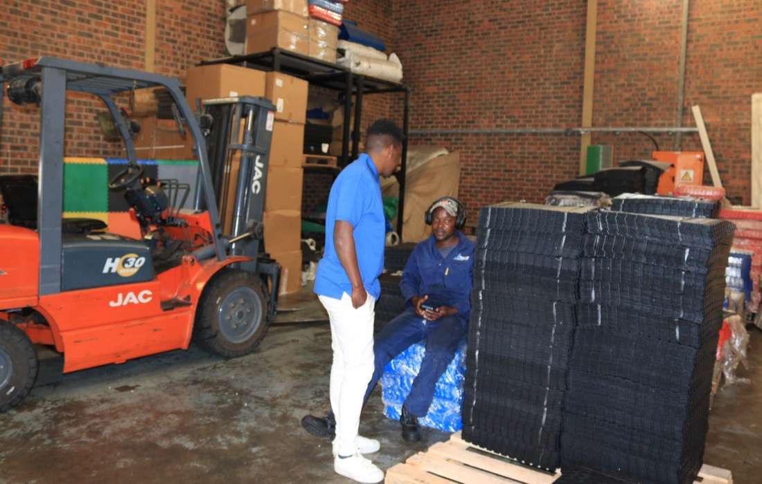PVC Floor Tile warehouse with flooring stock ready for customers