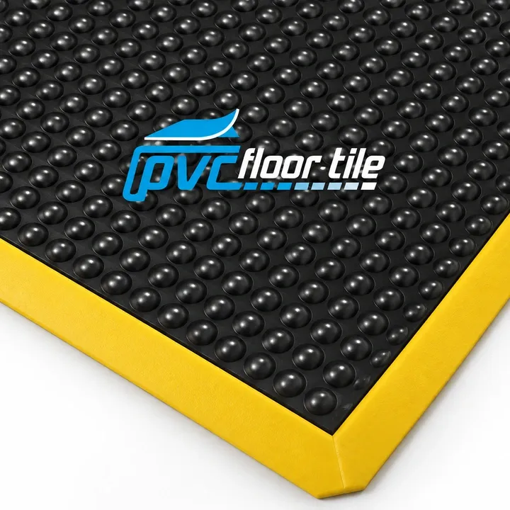 Black rubber anti-fatigue bubble mat with yellow edging