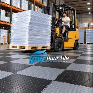 Black and grey interlocking PVC warehouse floor tiles with forklift
