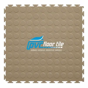 Beige PVC interlocking floor tile with raised coin surface
