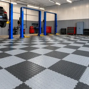 ack and light grey interlocking PVC workshop floor tiles with raised coin surface