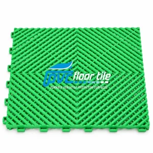 Green garage vented drainage mat 395 × 395mm with interlocking open-grid surface.