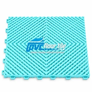 Turquoise breathable surface tile 395×395×18.1mm with interlocking open-grid design.